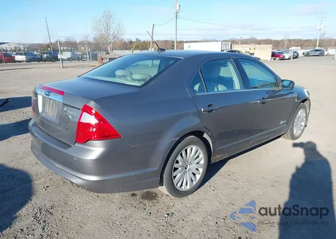 2010 Ford Fusion Hybrid z USA, uszkodzony, nr VIN 3FADP0L3XAR143399